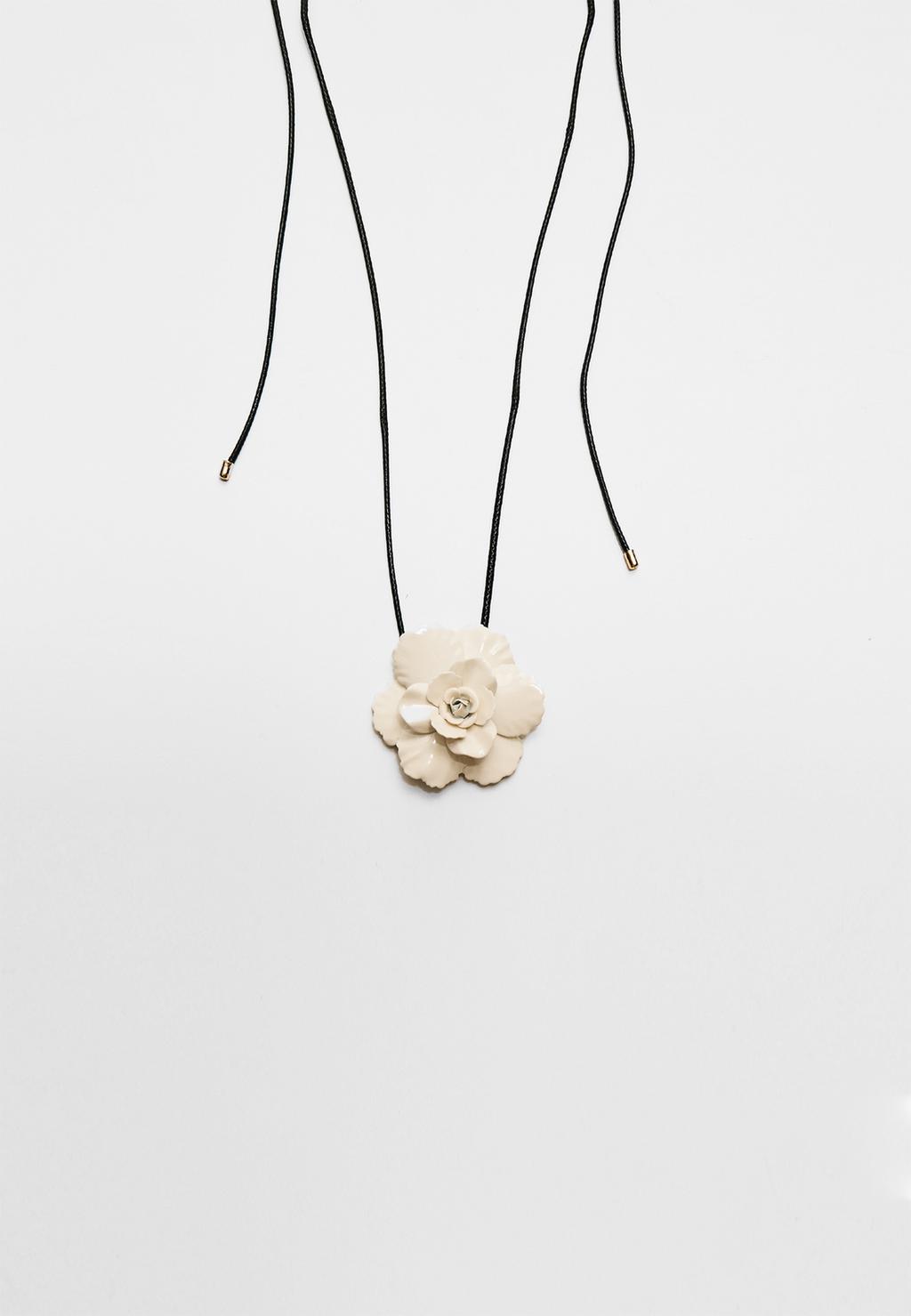 Cord necklace with metal flower