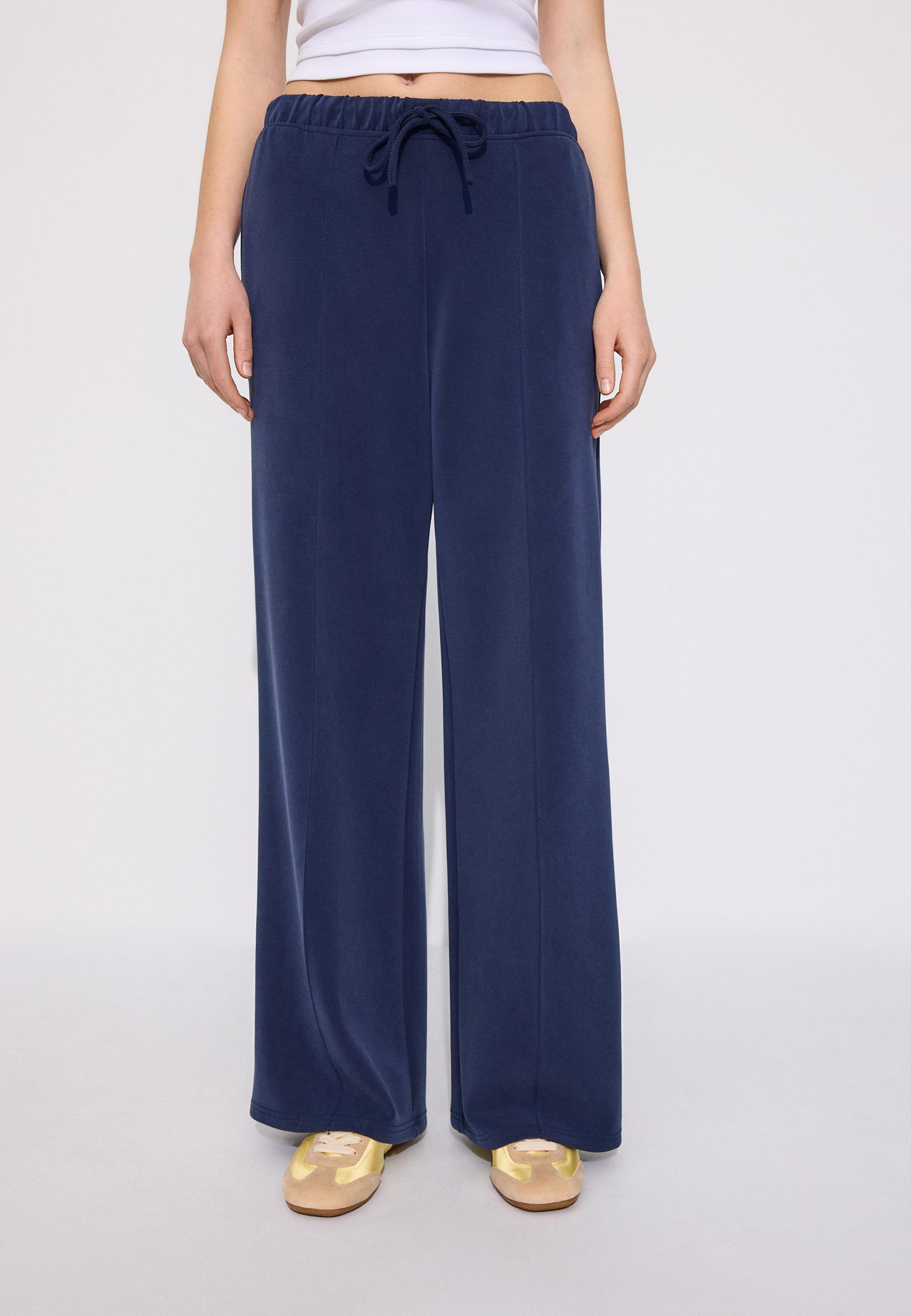 Soft-touch wide-leg pin-tuck joggers — Navy blue