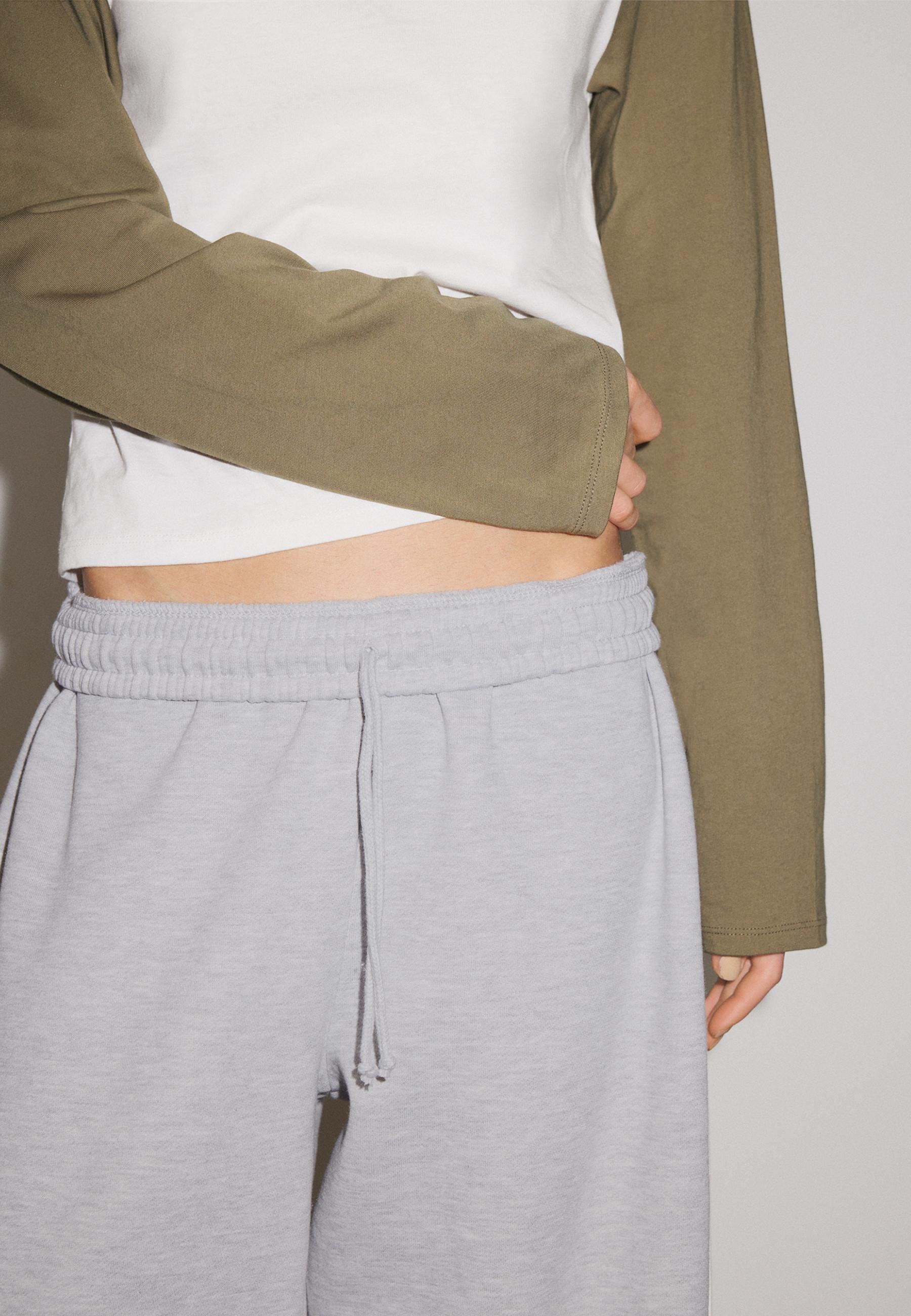 Plush joggers with piping and toggles — Grey melange