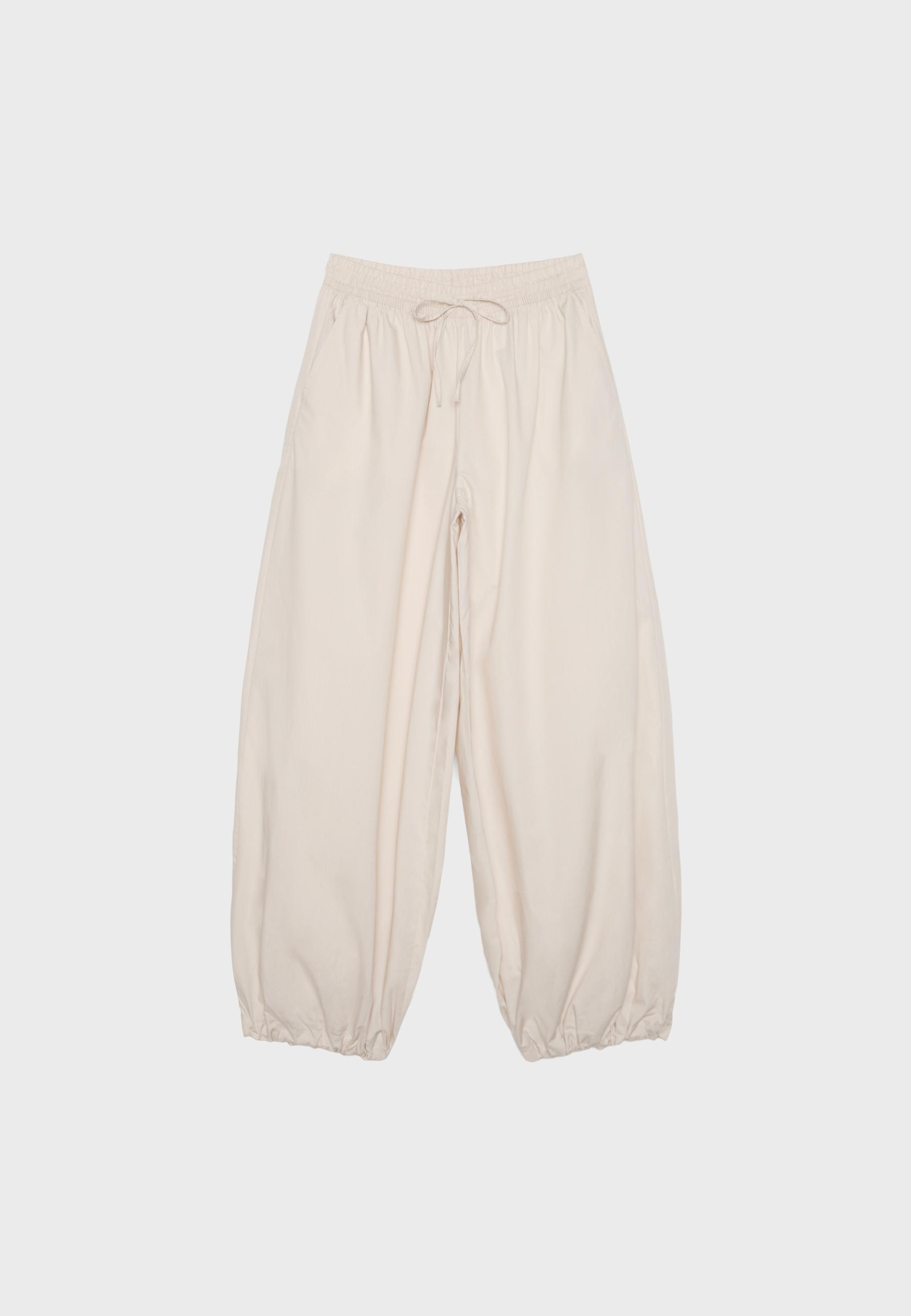 Balloon poplin trousers with stoppers — Stone