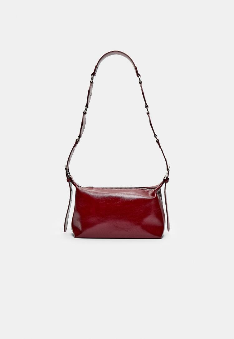 bolso bandolera tachas