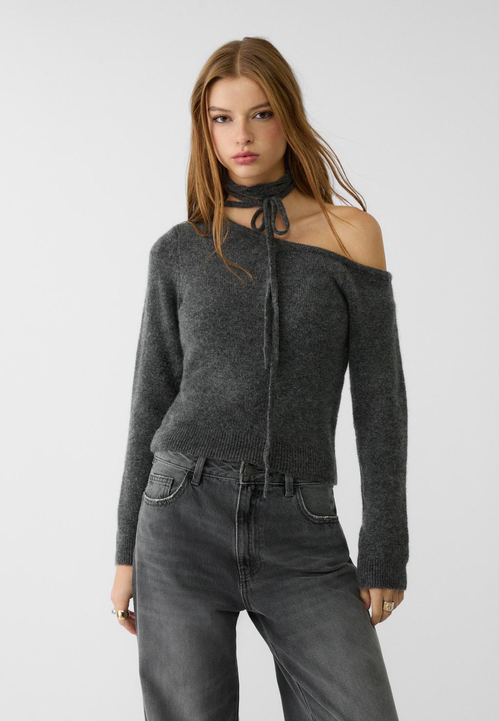 Asymmetric knit sweater with tie detail