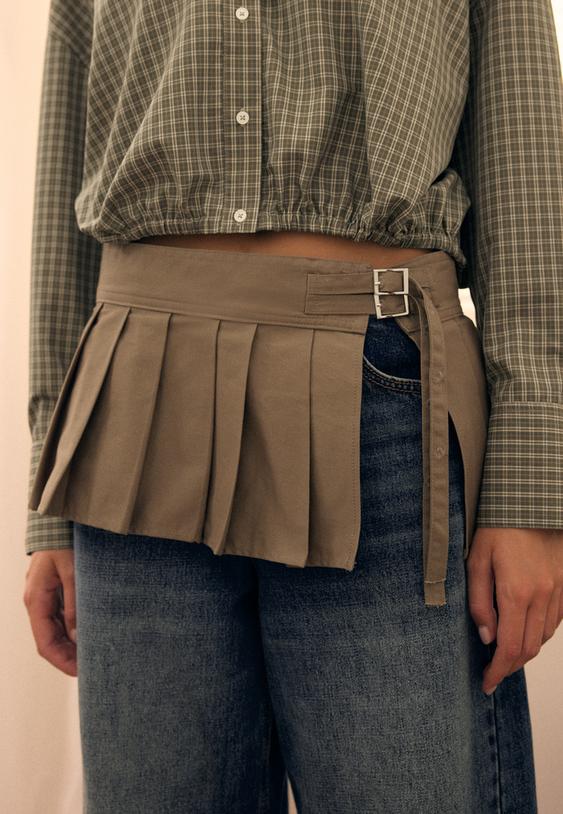 ceinture a plis et boucle
