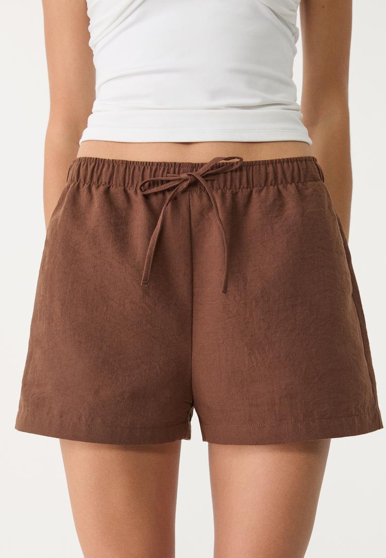 short cintura elastica fluido