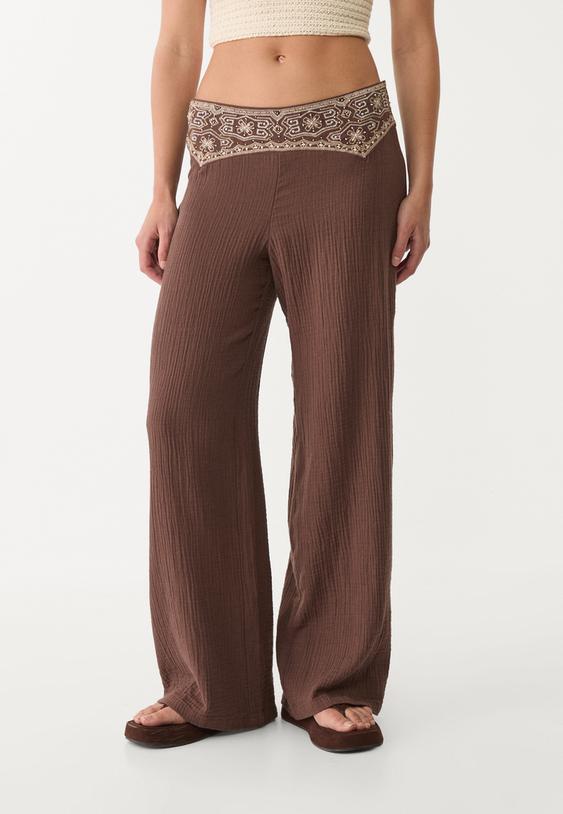 dokumlu islemeli dokulu pantolon