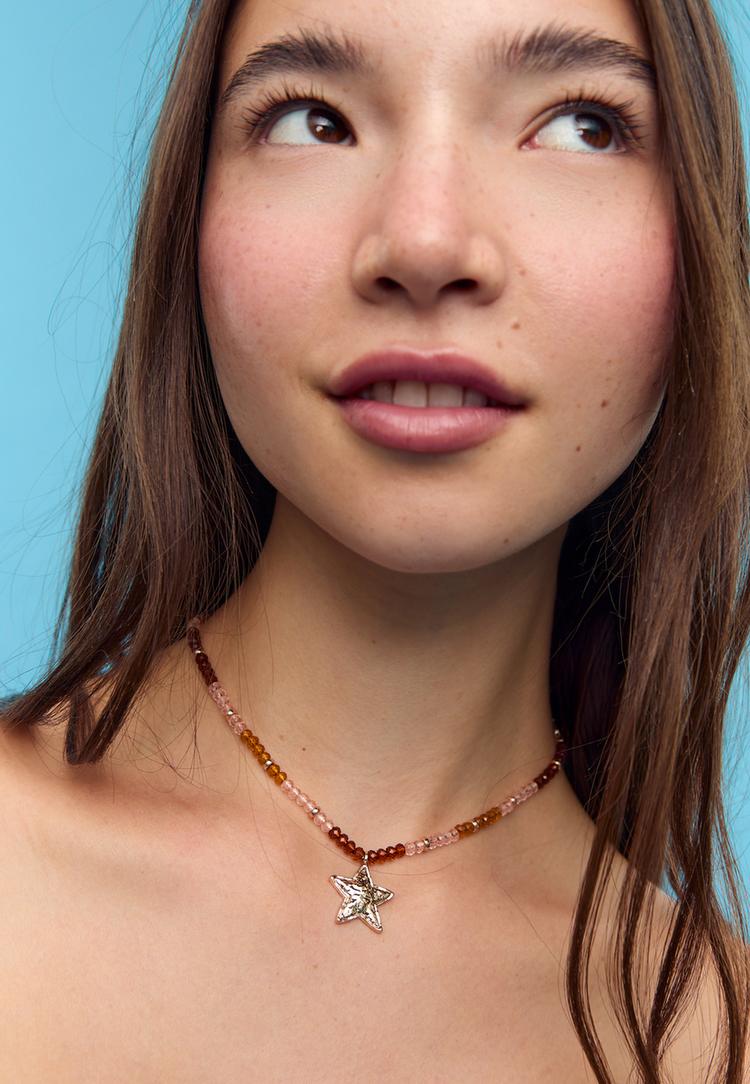 set of 2 beaded and star necklaces