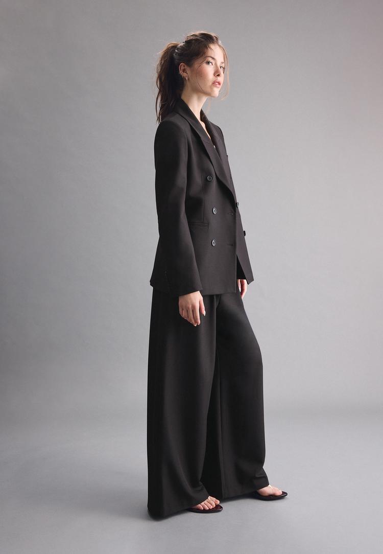 wideleg smart trousers with adjustable buttons