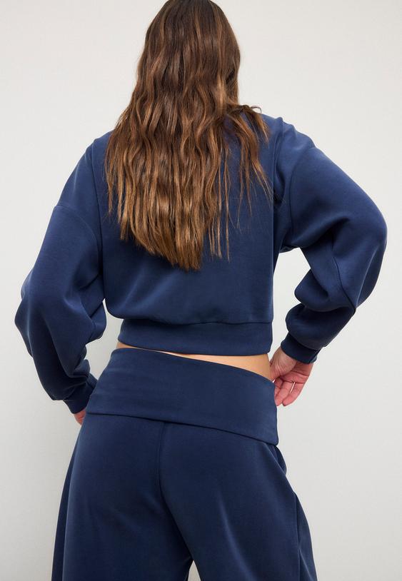 sudadera tacto suave manga murcielago