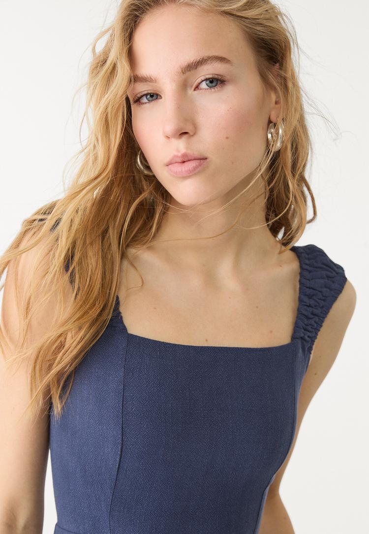 vestido fluido midi cruzado espalda con lino