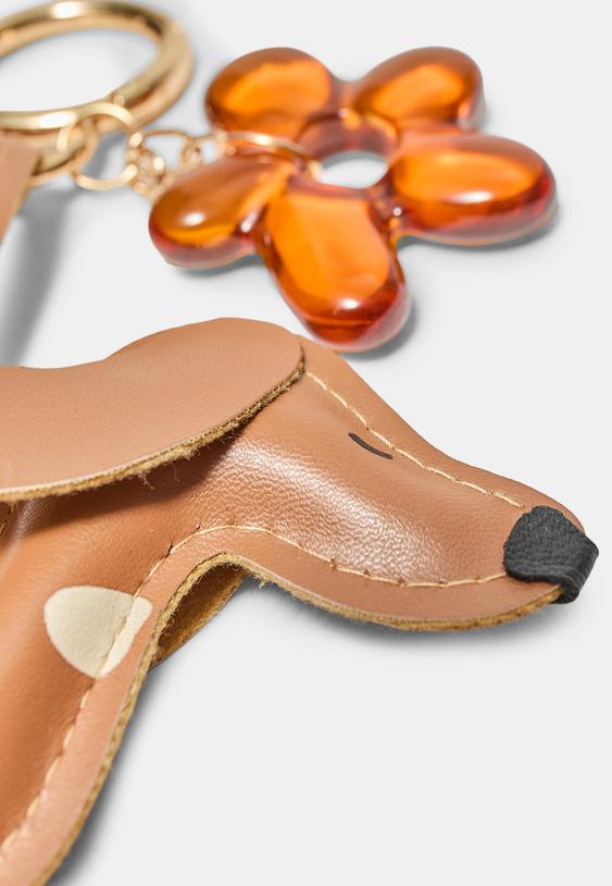 llavero charm perro y flor