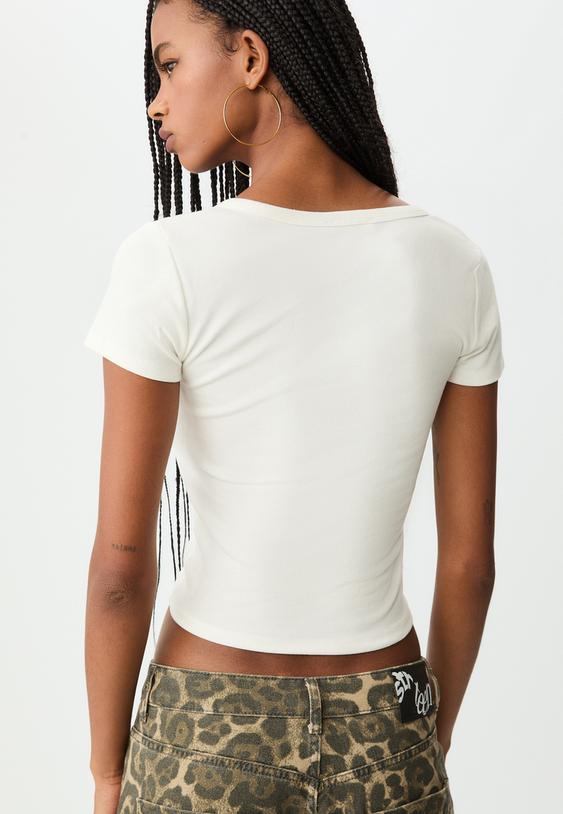 camiseta manga corta botones