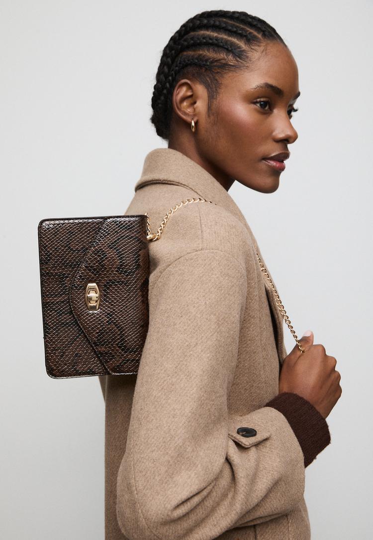 mala a tiracolo rigida com fecho