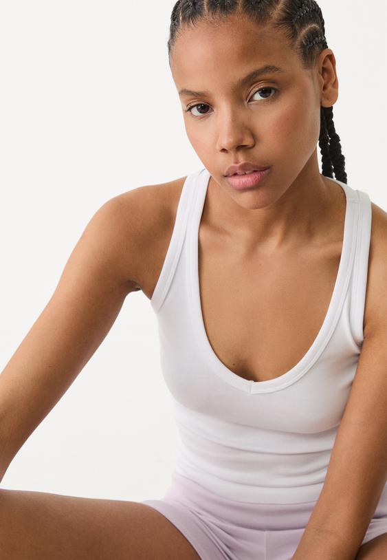 canotta scollo nuotatore con scollo a v