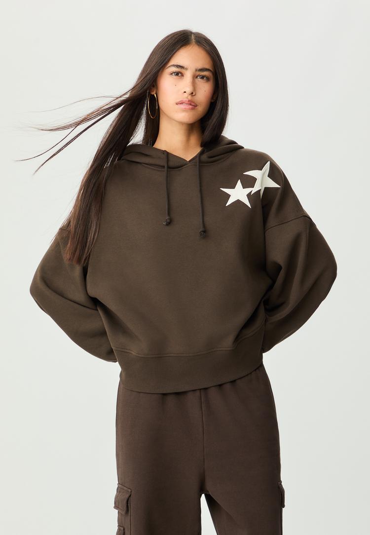 capuchon sweater sterren