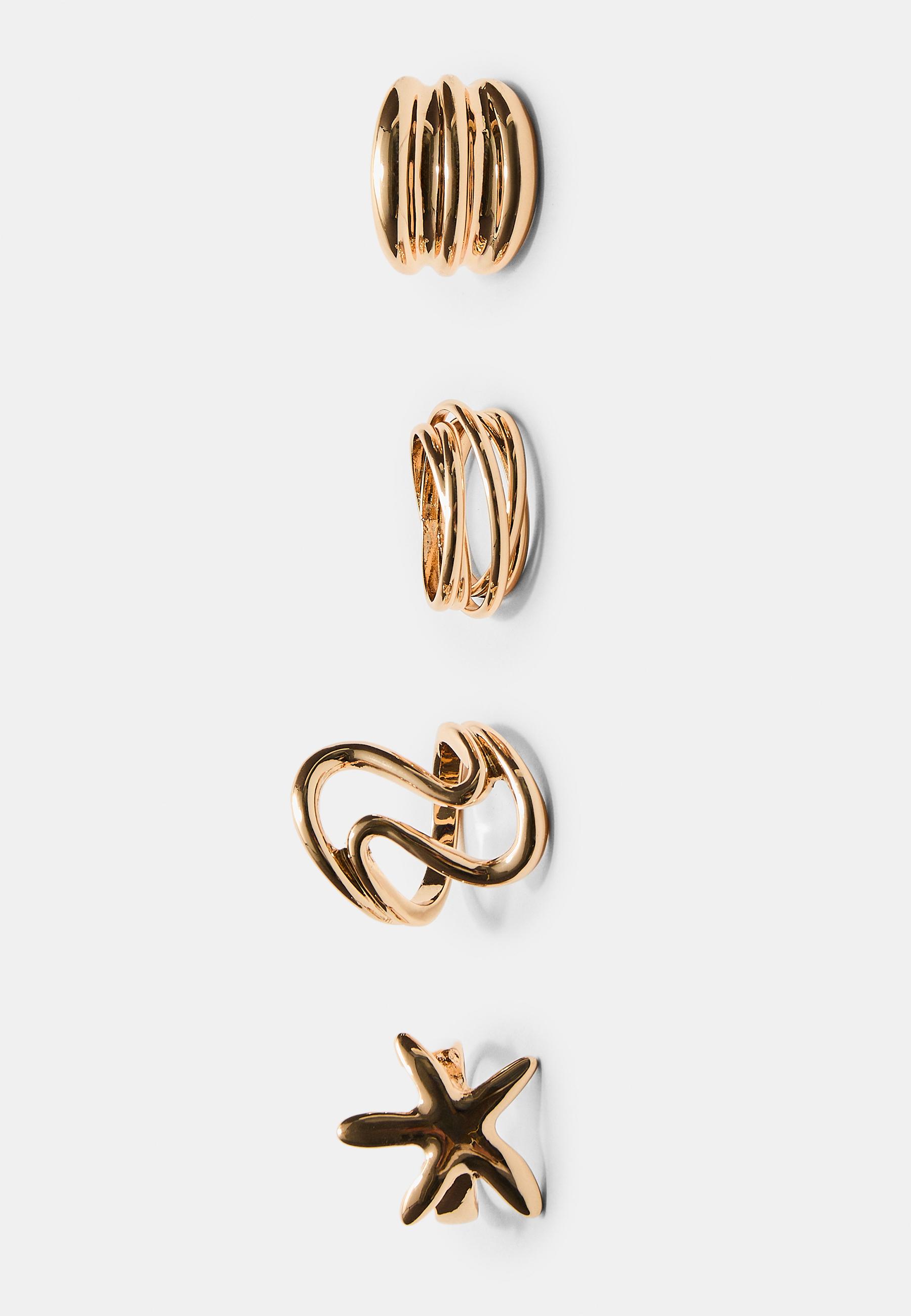 Set of 4 star rings — Gold