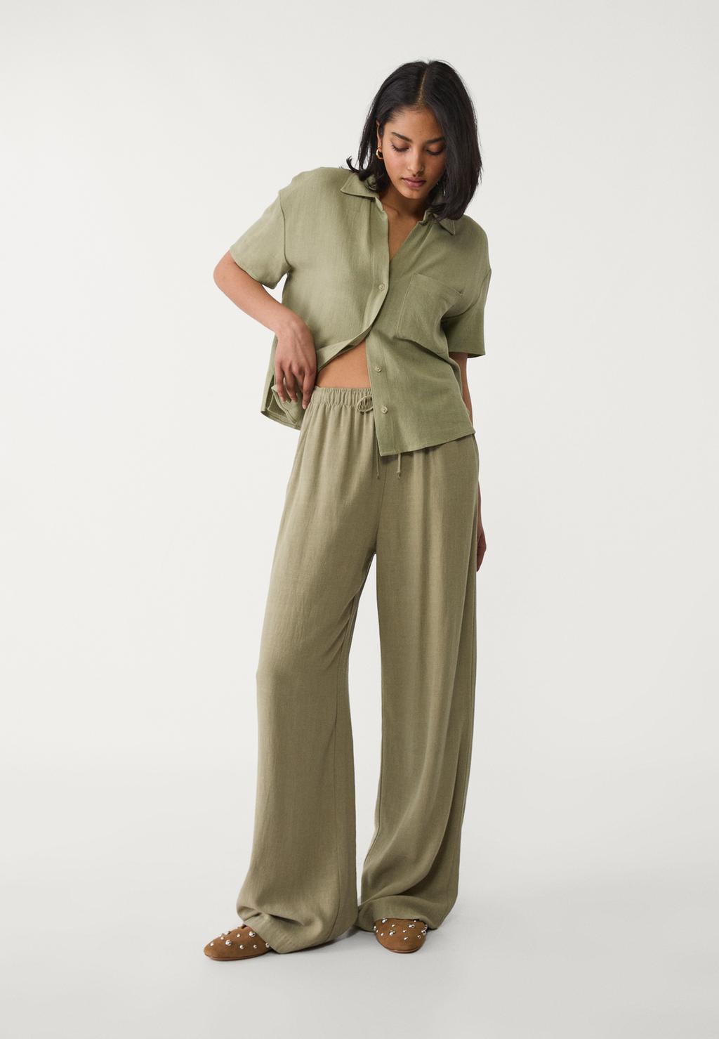 Loose-fitting linen blend trousers