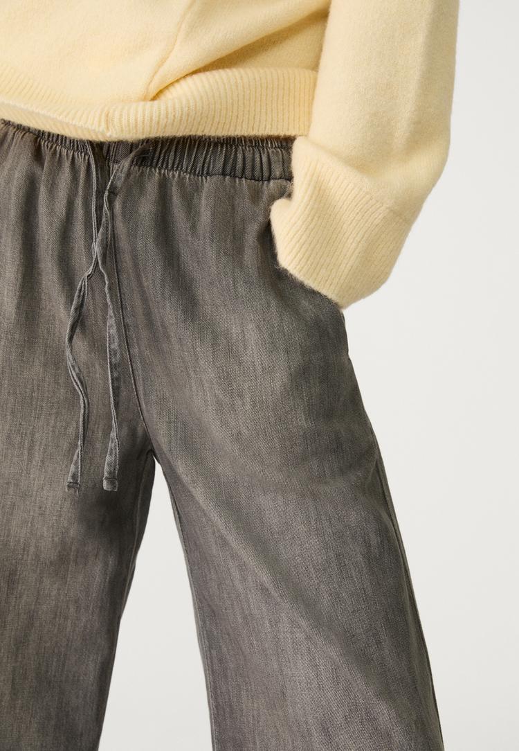 lange soepelvallende jeans