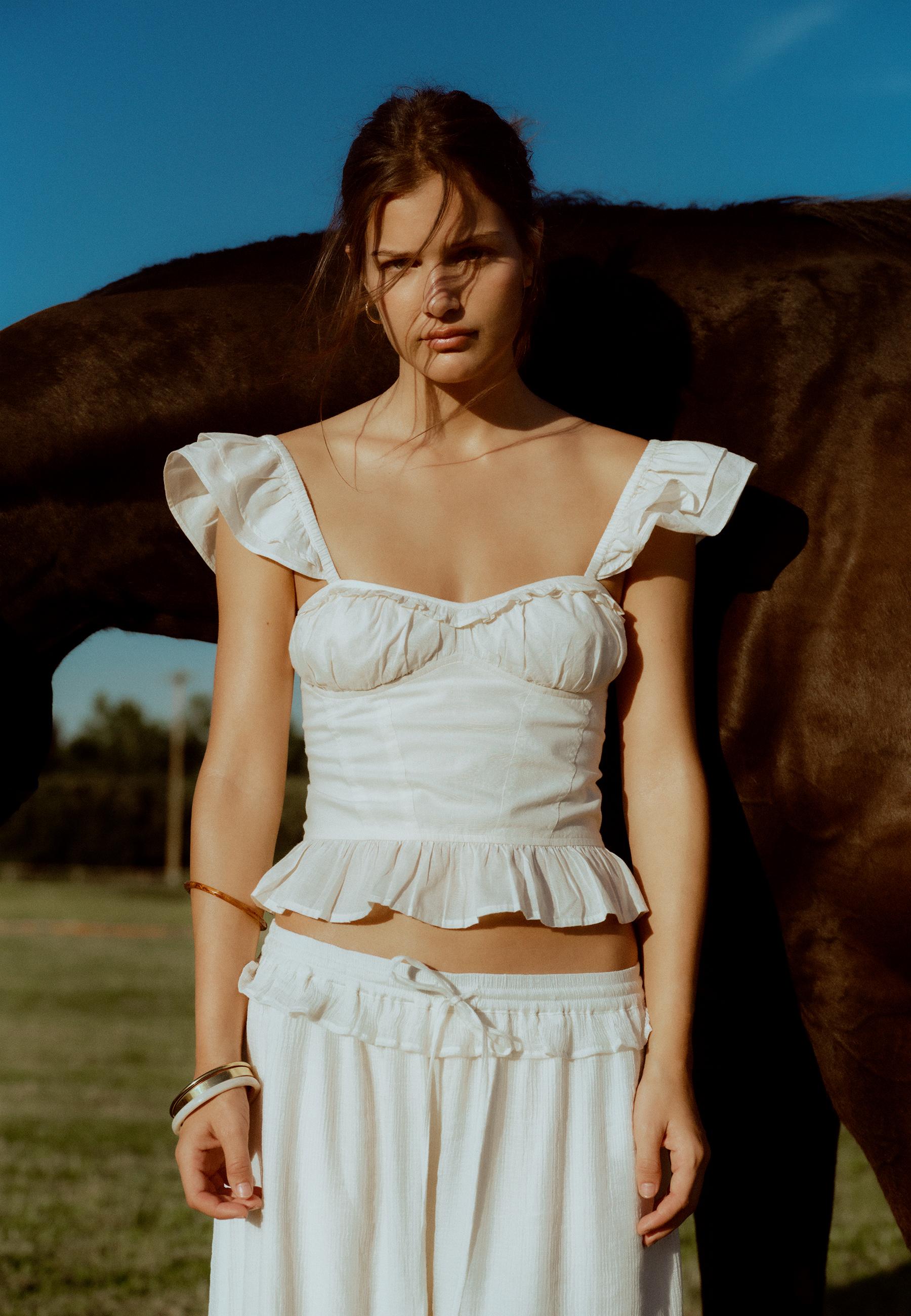 Ruffled corsetry-inspired top — Ecru