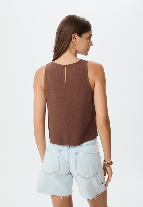 top nadadora fluido con lino