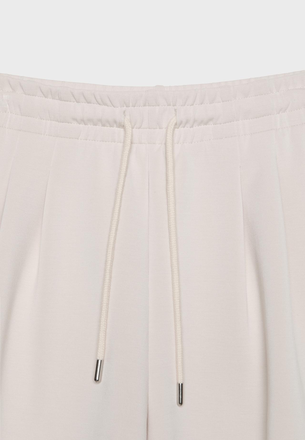Soft-touch shorts with darts — Stone