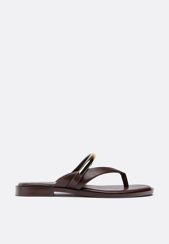 flat thong sandals with metal detail