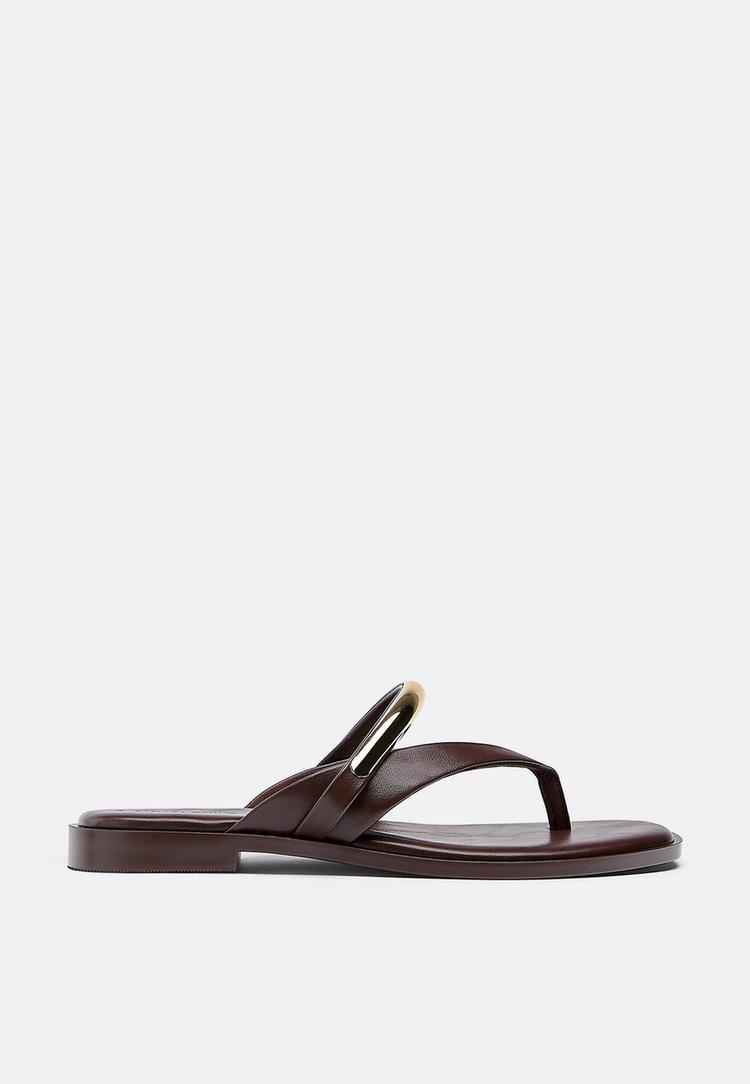 flat thong sandals with metal detail