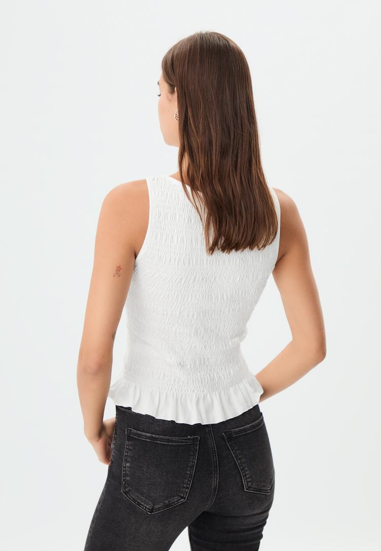 camiseta fruncida volantes