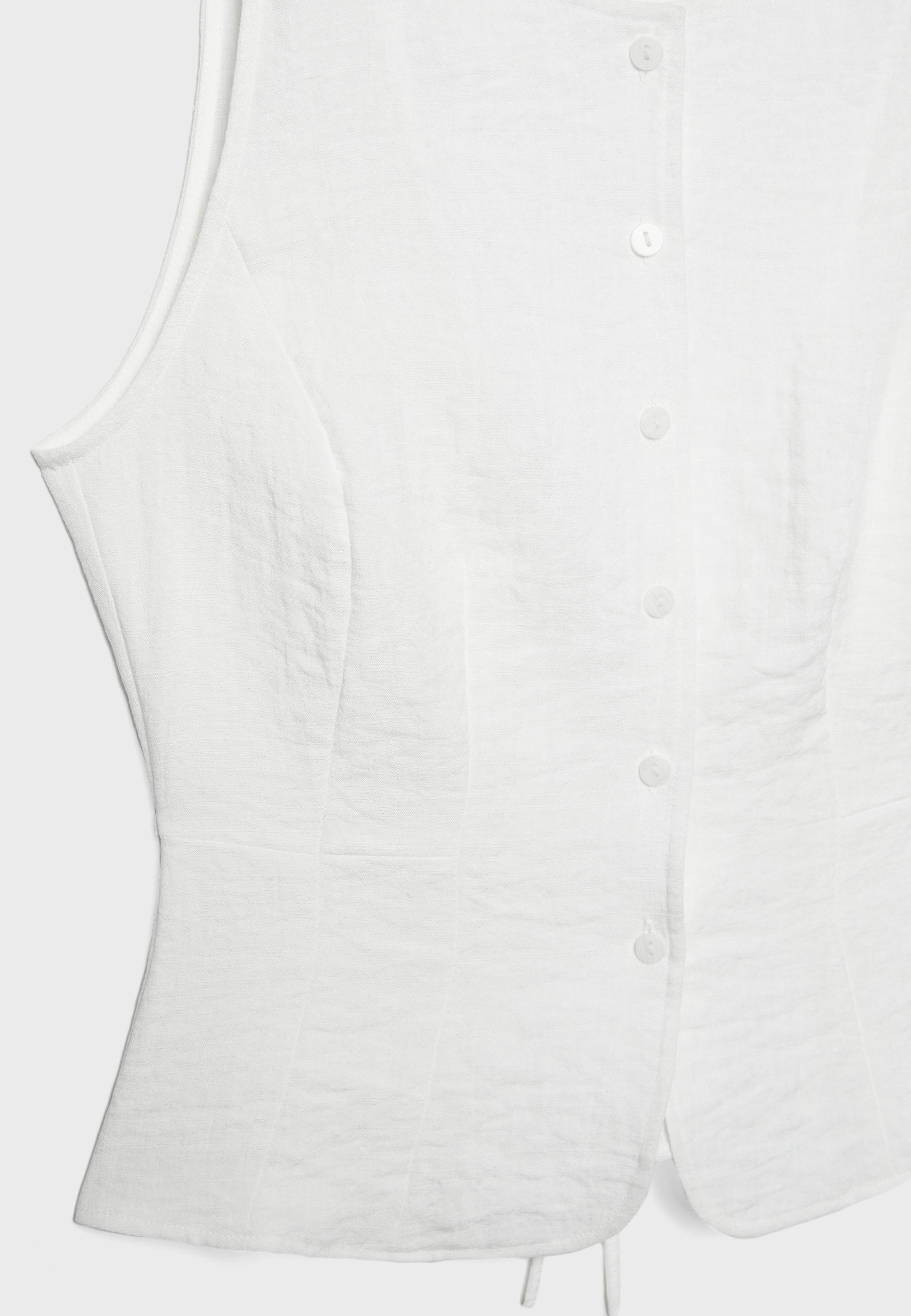 Buttoned waistcoat — Ecru