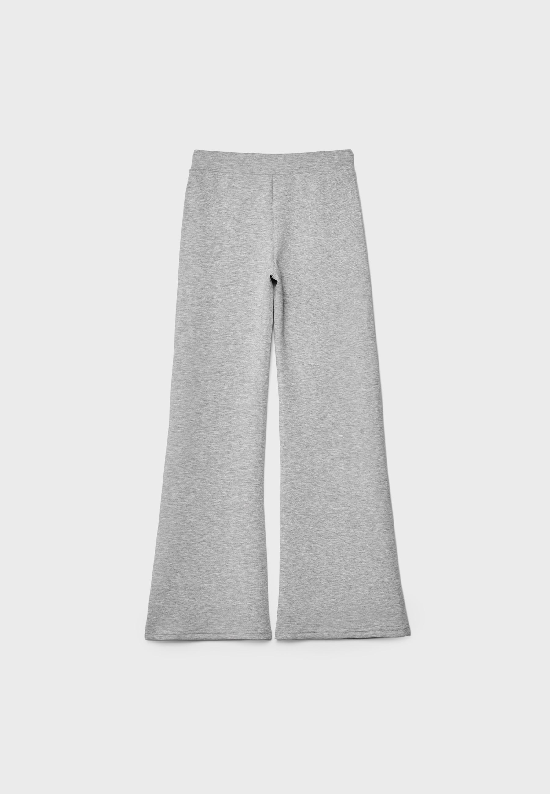 Soft-touch bell bottom trousers with front seam detail — Grey melange
