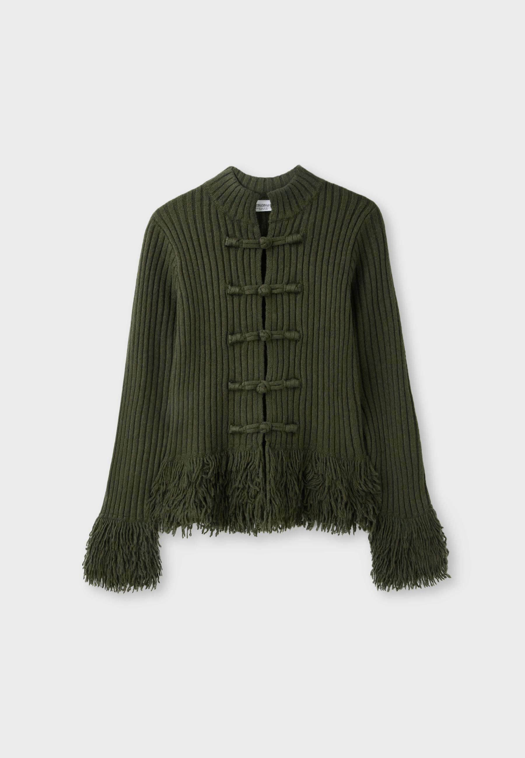Chaqueta punto flecos