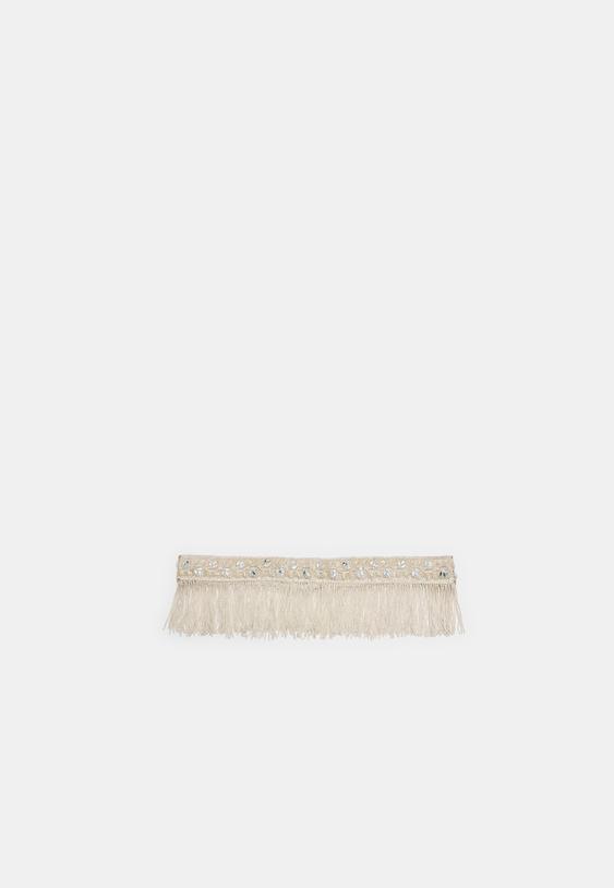 faux pearl and fringe belt
