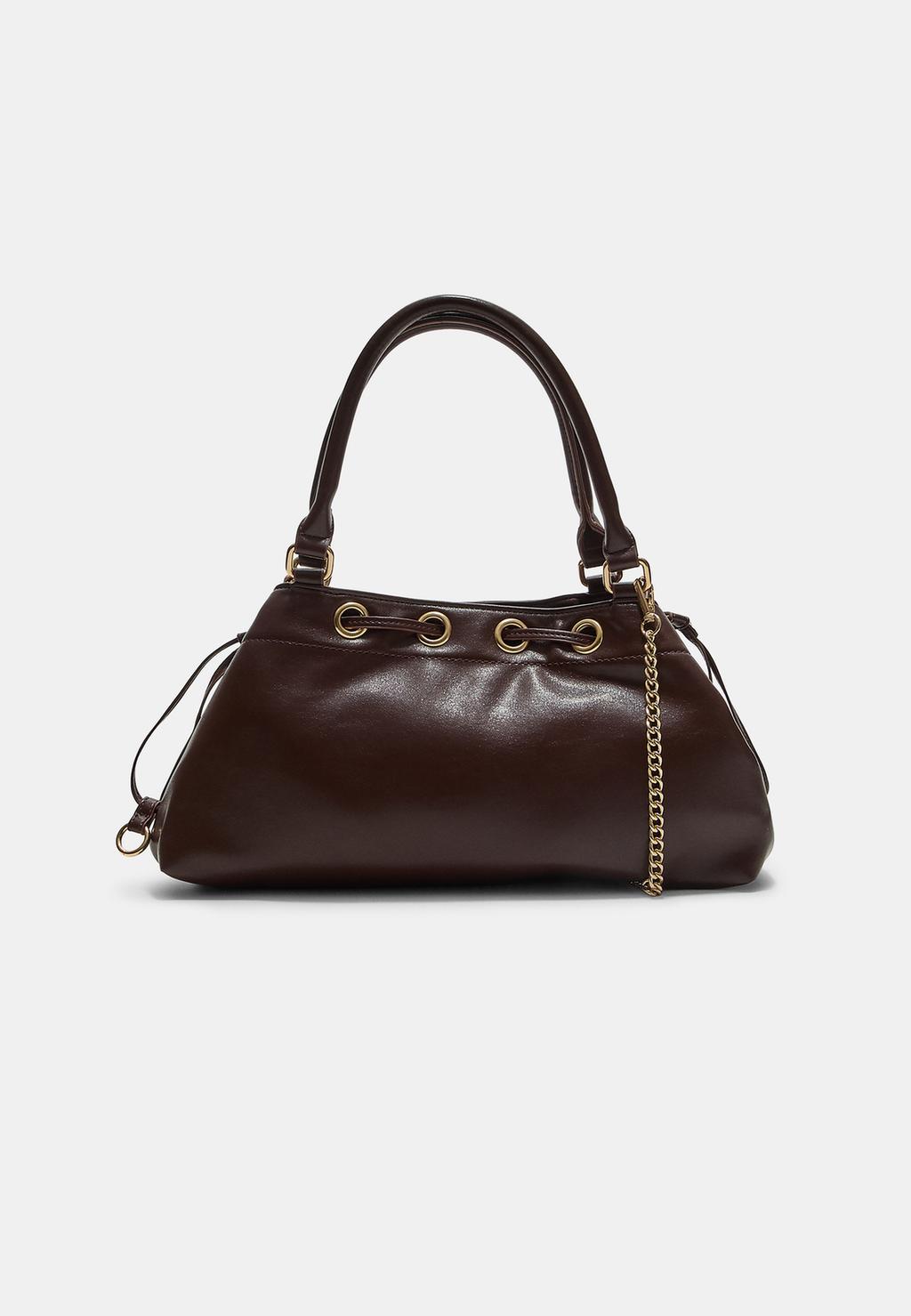Shoulder bag with eyelets