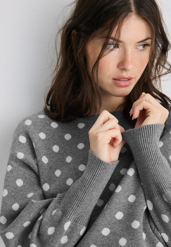 asymmetrische trui met geribde zoom