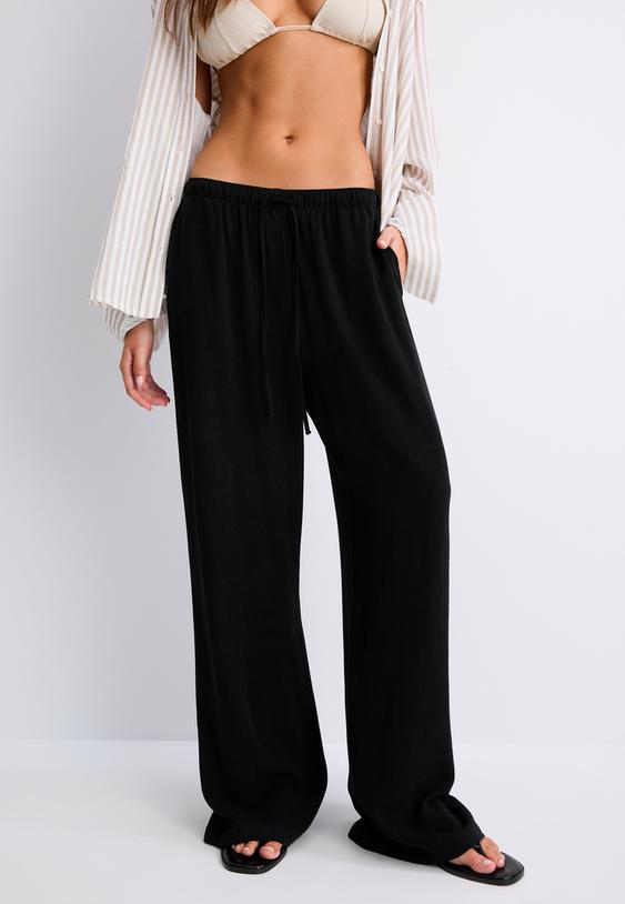 pantaloni fluidi effetto lino