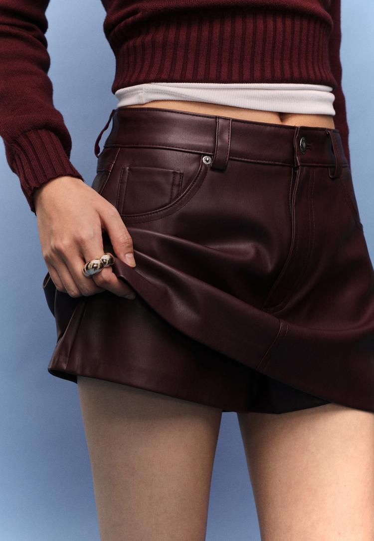 d62 falda pantalon mini efecto piel