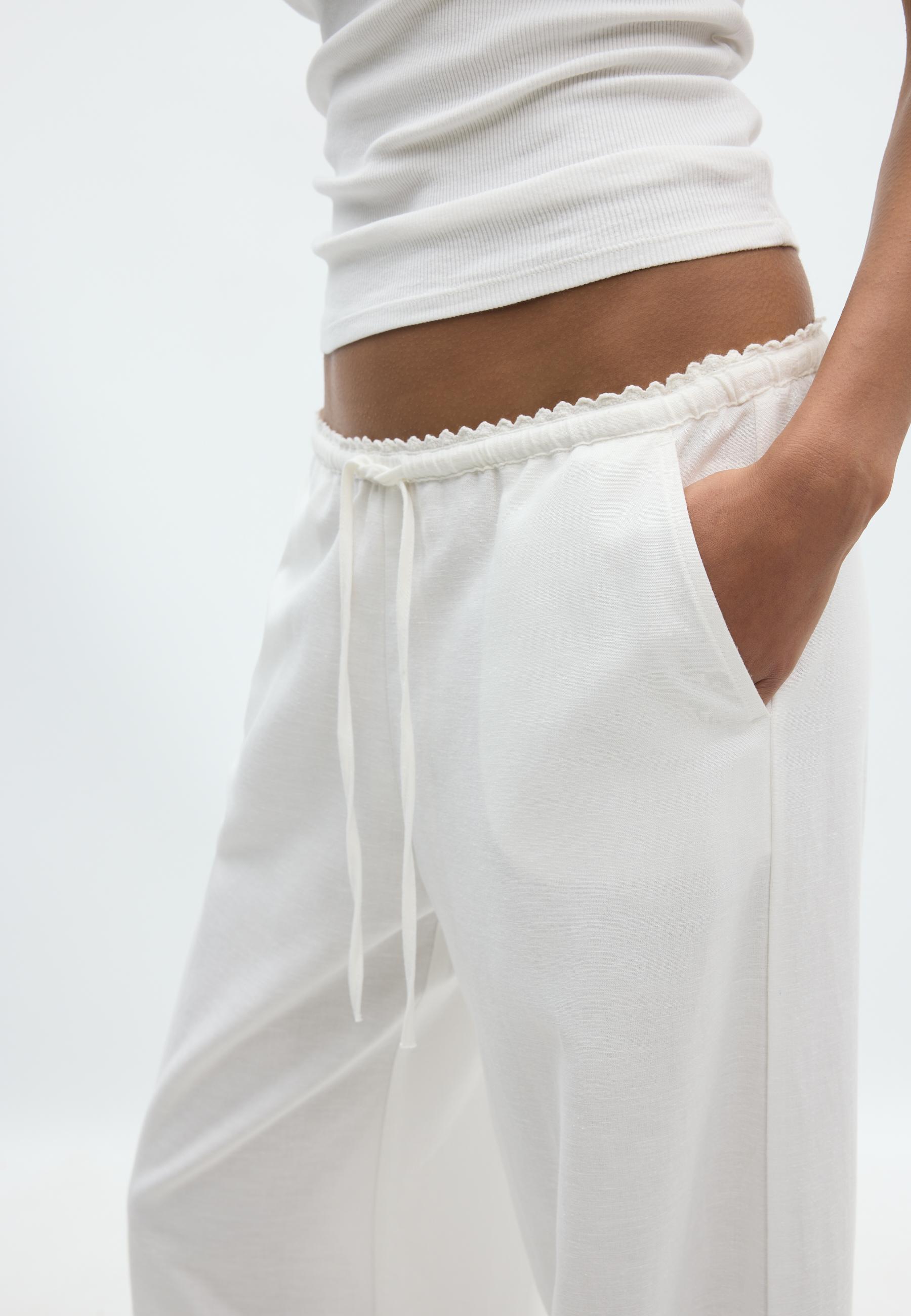 Wide-leg linen-effect trousers — Ecru