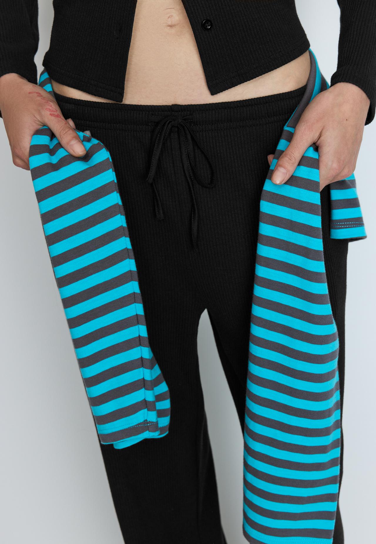 Soft-touch ribbed trousers — Black