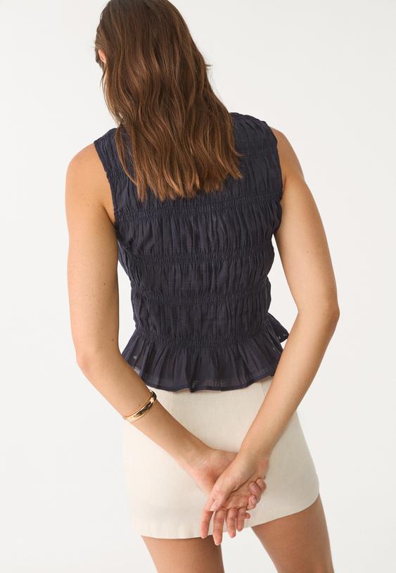 creased top with ties