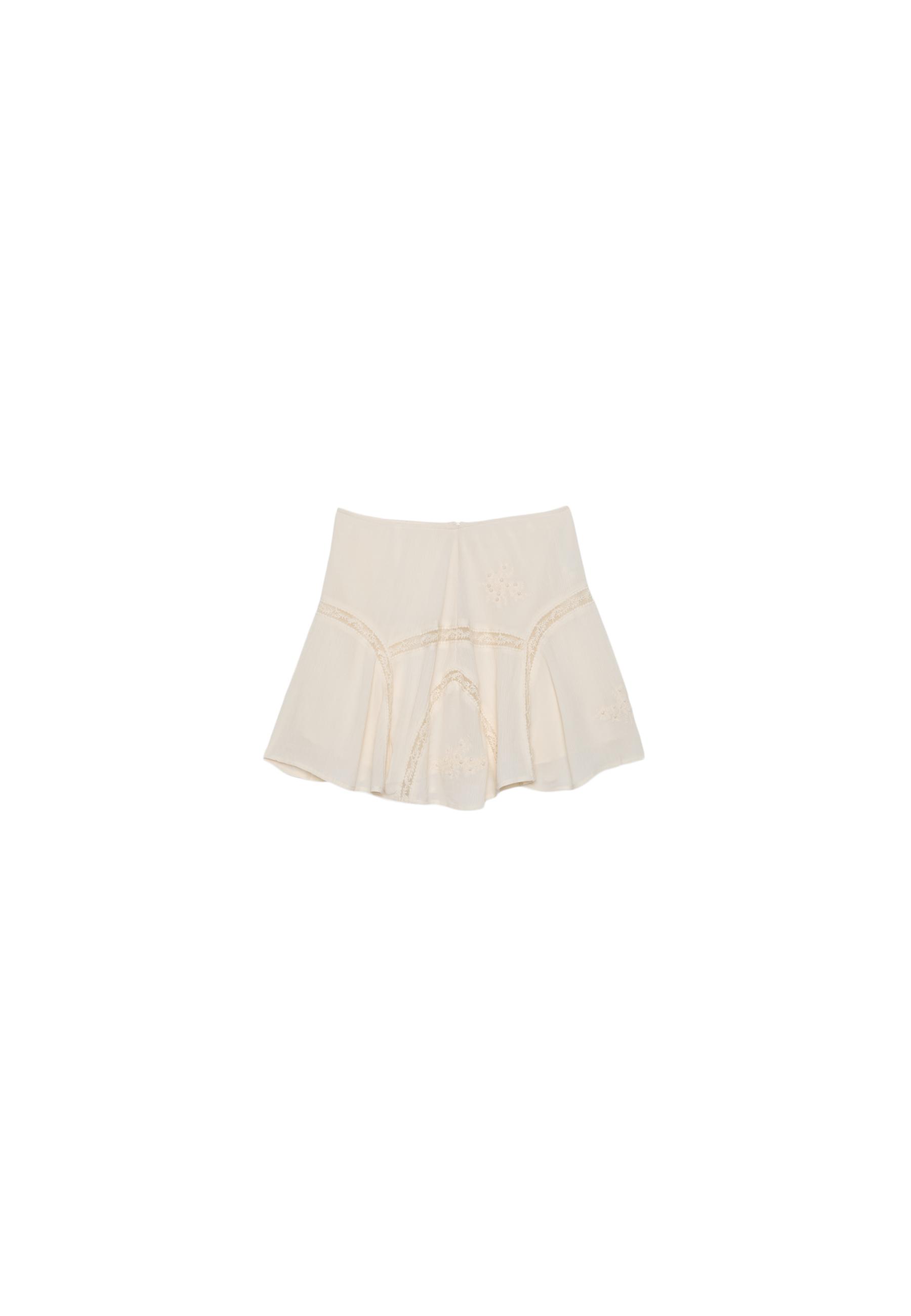 Embroidered godet mini skirt