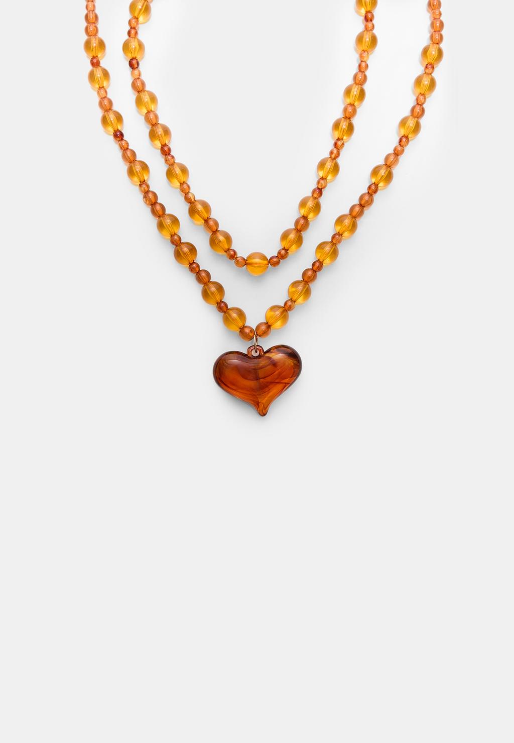 Set di 2 collane con perline e cuore