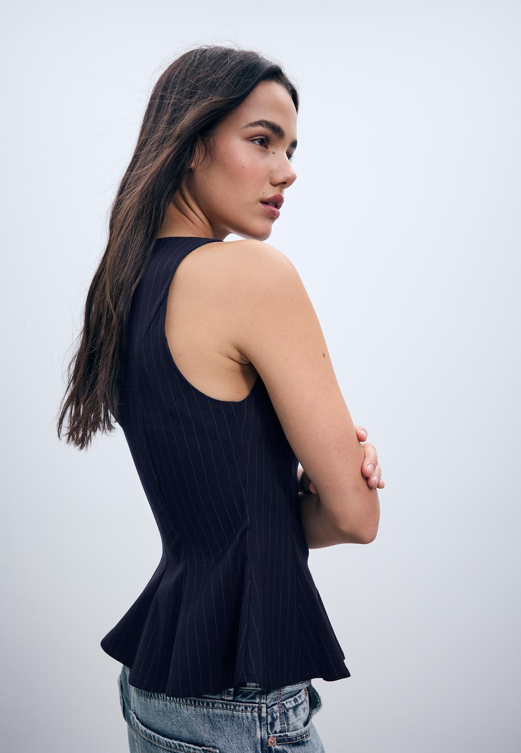 Top peplum sin mangas rayas