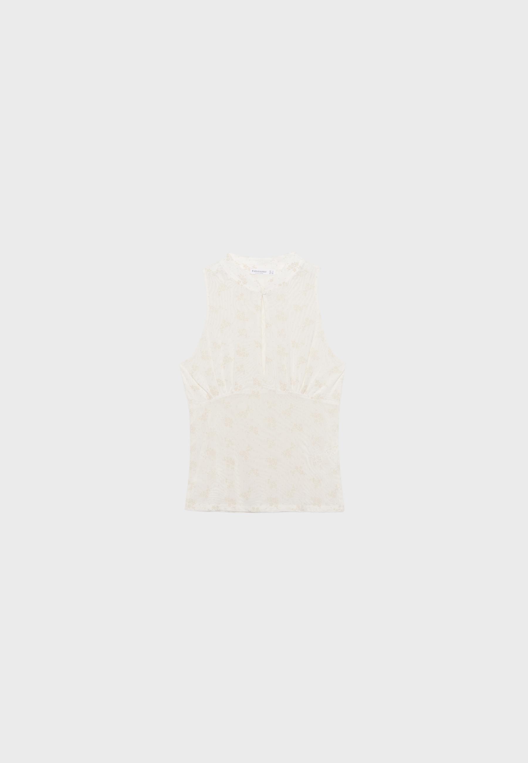 Sleeveless stand collar top with split — Ecru