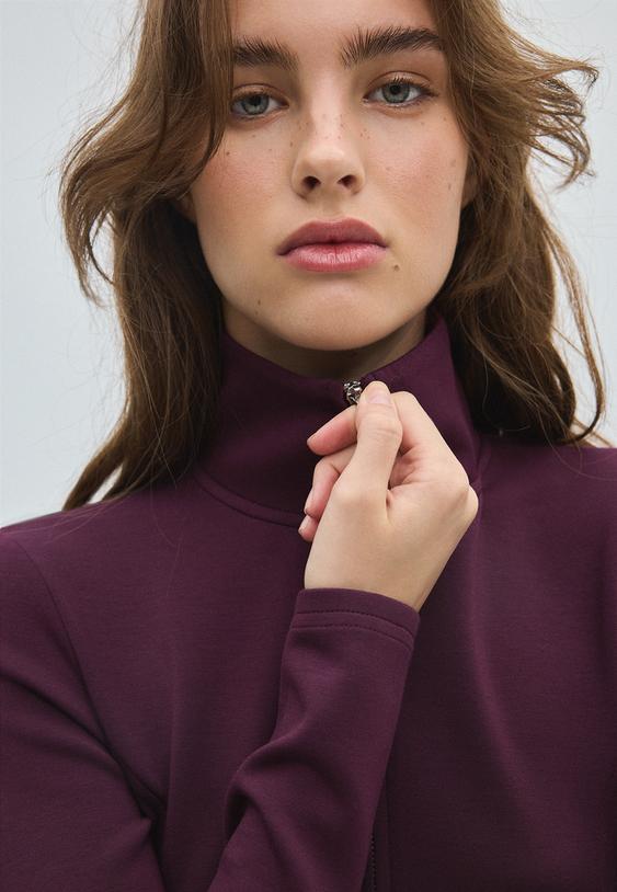 yumusak dokulu fermuarlı vucuda oturan sweatshirt