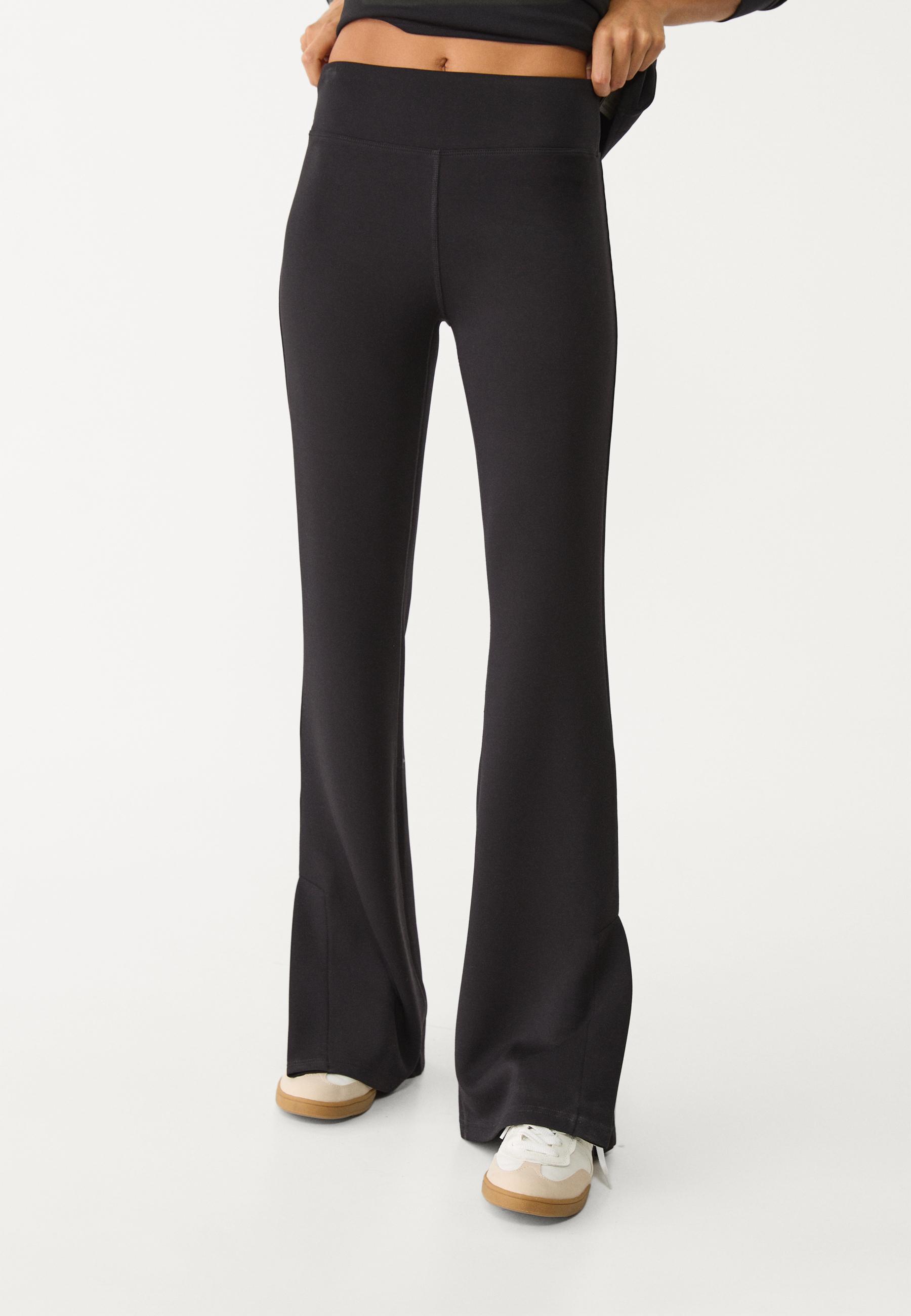 Soft-touch bell bottom trousers — Black