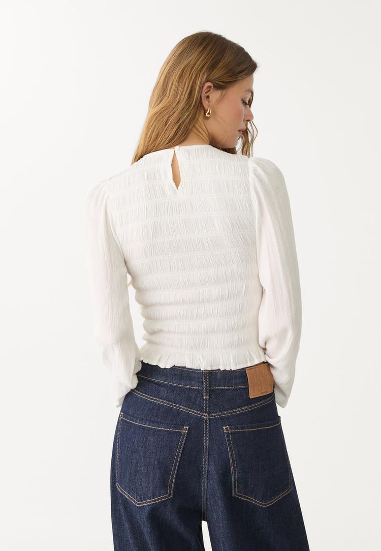 blusa volantes