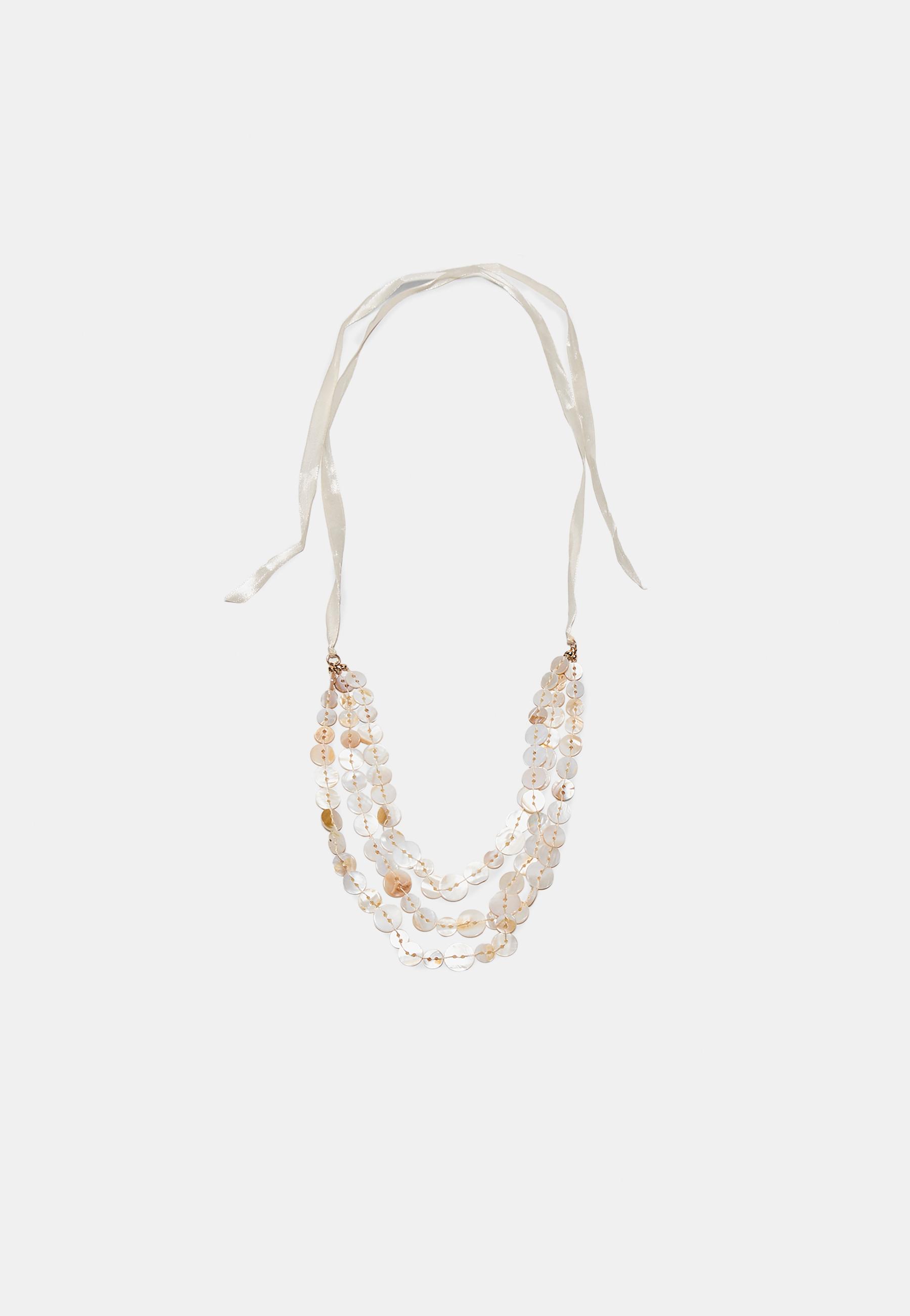Multi-layered button necklace — Ecru