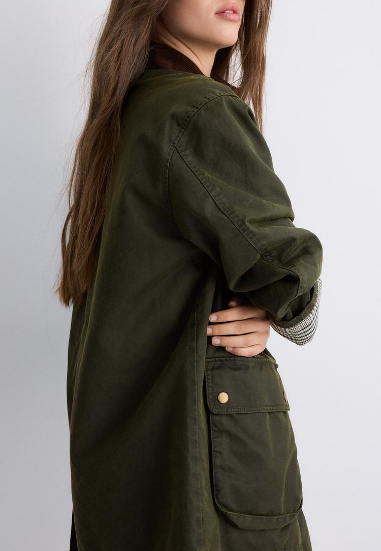 parka encerada multi bolsillos
