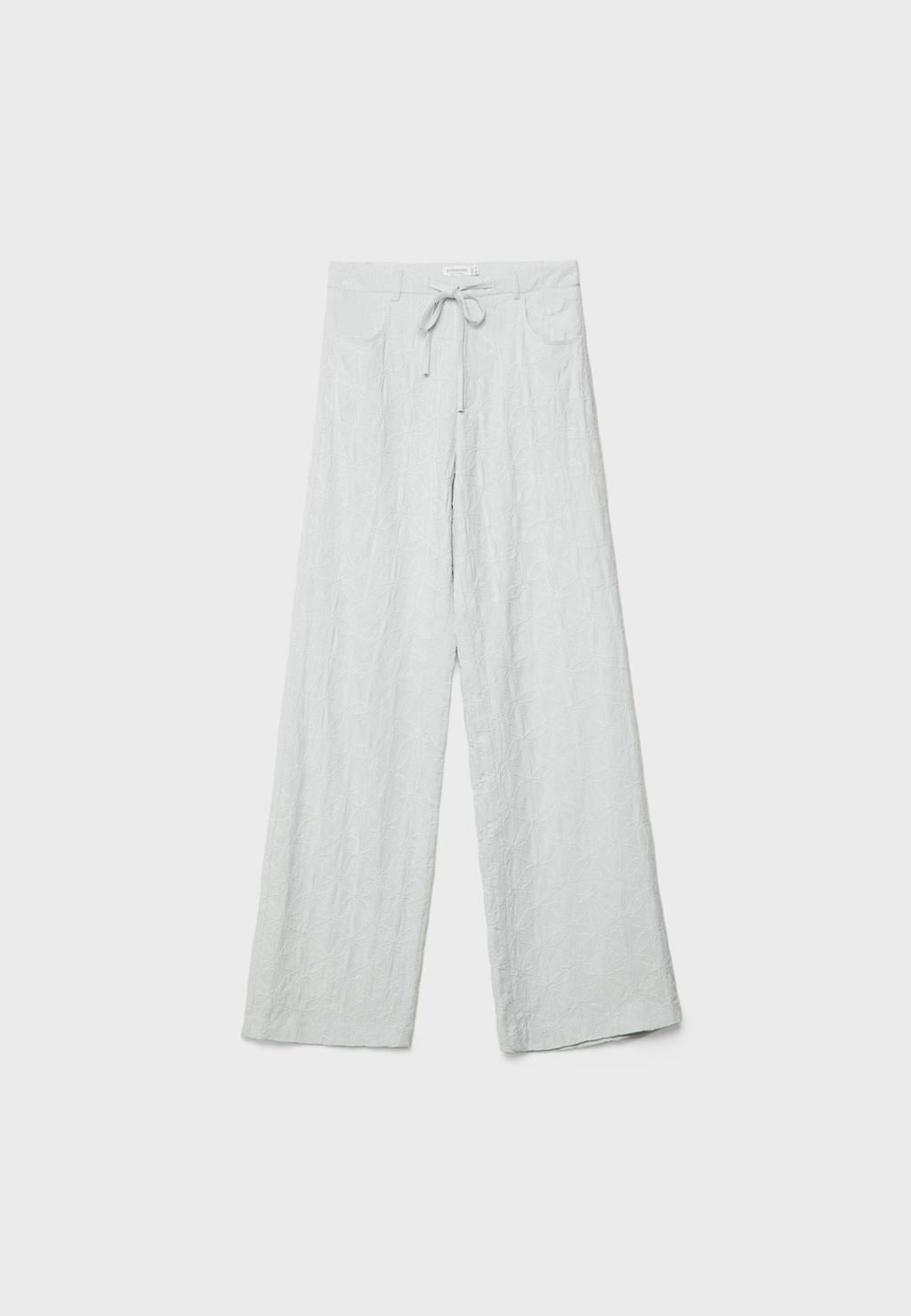 Pantalón straight bordados con lino