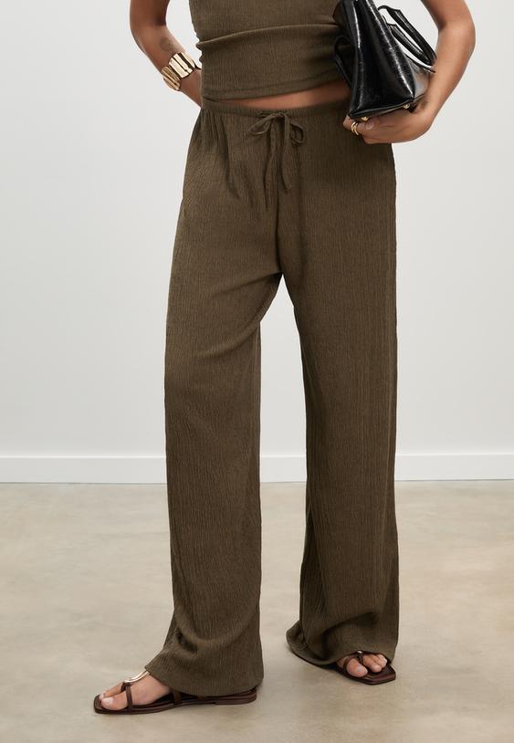 flowing creased effect trousers