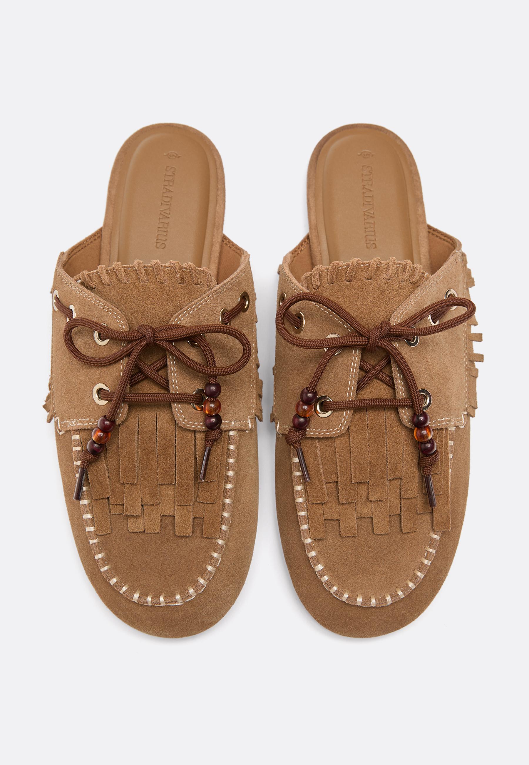 Backless leather loafers with charms — BEIGE